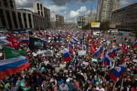 Митинги в поддержку действующей власти прошли в России и Казахстане